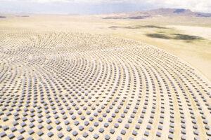 Aerial view of desert solar panel farm.