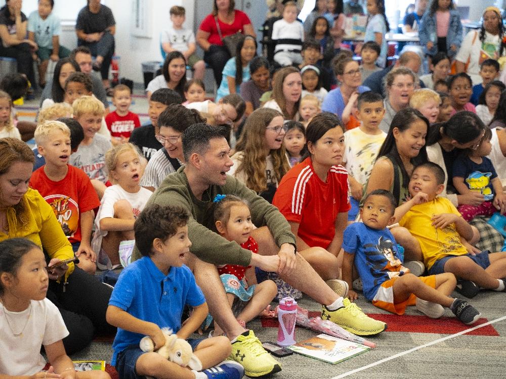 Diverse group attending a lively community event.