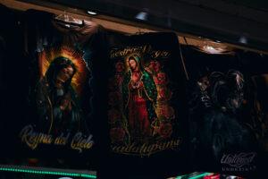 Religious-themed t-shirts on display