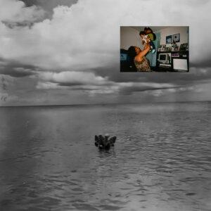 Black and white ocean view, small family moment inset.